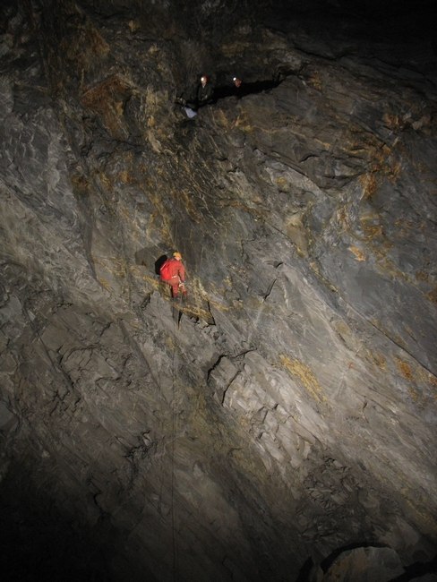Abseiling the first drop inside the mine