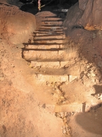 Steps down through the main passage