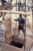 Derek supervising at the shaft top. The buckets were raised to the next level for emptying