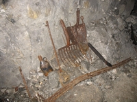 Mining tools left at a bothy on the 40 yard level. The enamelled can still contains a liquid.