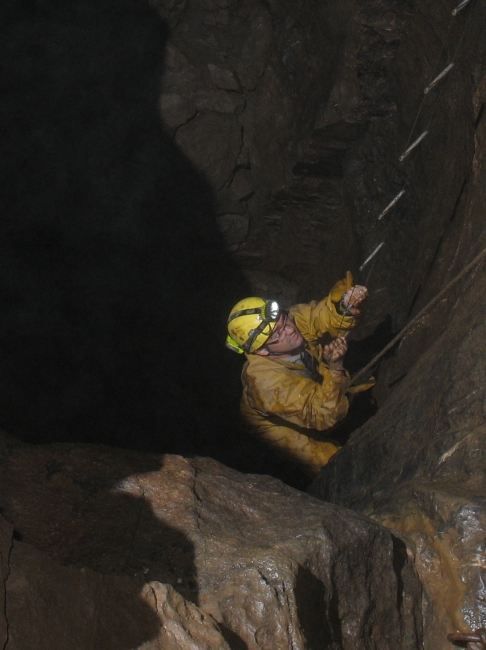 Ladder climbing in Bagshaw Cavern Ladder climbing in Bagshaw Cavern